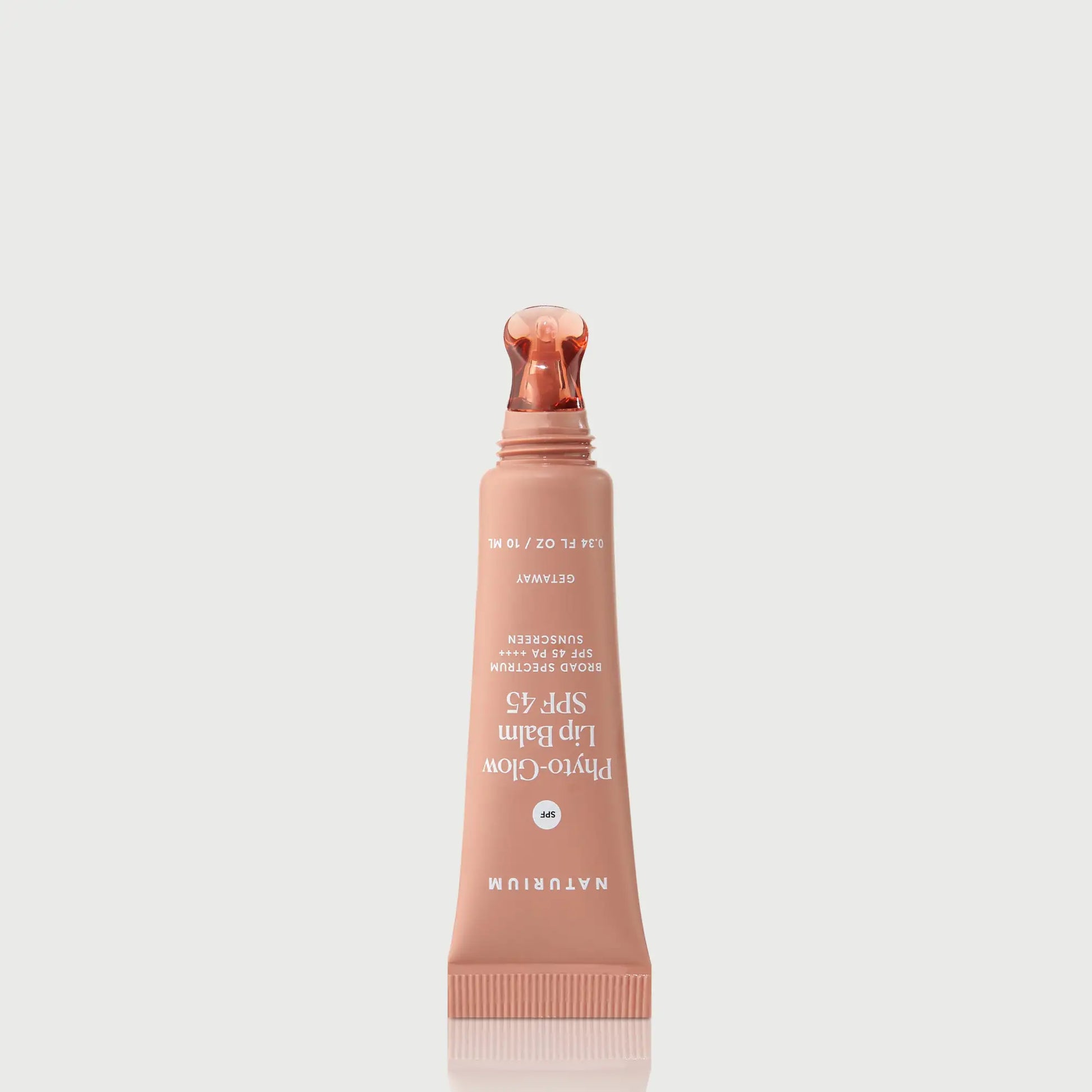 phyto-glow-lip-balm-spf-45-getaway-b8 NATR-10126_PhytoGlow_SPF_Getaway_primary_nocap_bonebkgd_1.webp