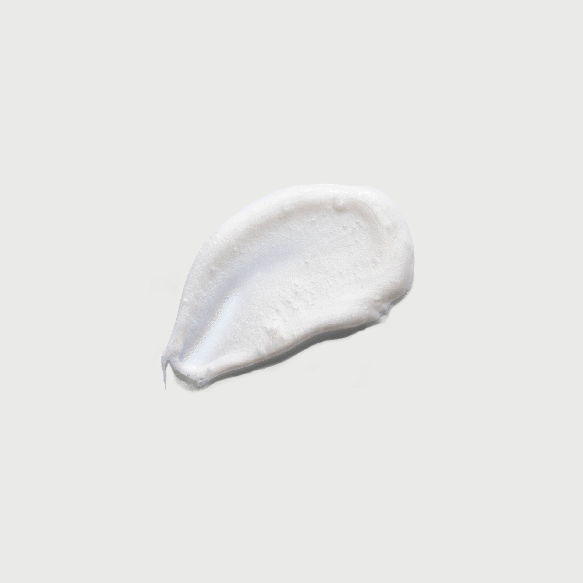 the-smoother-glycolic-acid-exfoliating-body-wash-q7 NATR-40002-Swatch-The-Smoother-Glycolic-Acid-Exfoliating-Body-Wash-bonebkgd.jpg