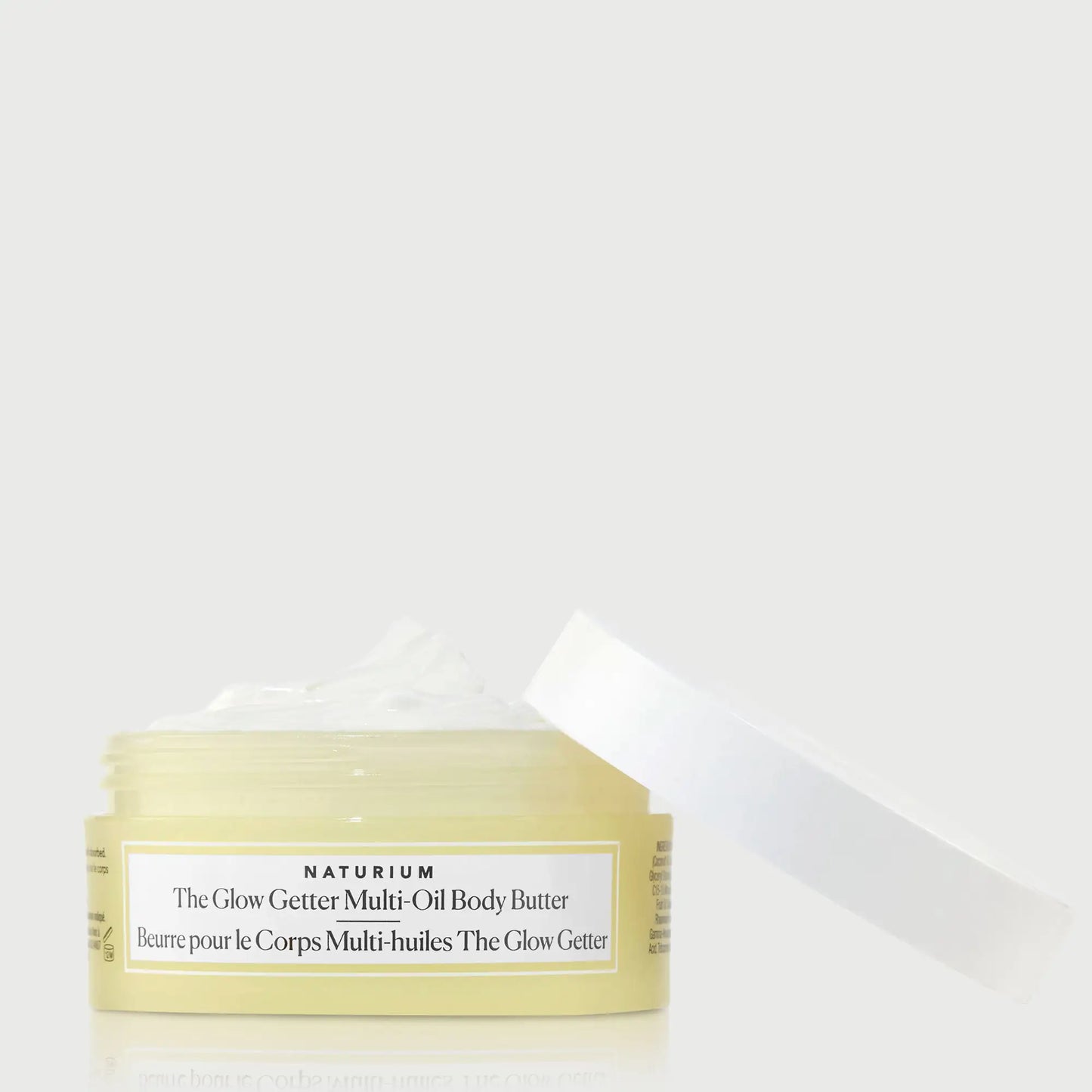 the-glow-getter-multi-oil-body-butter-travel-size-p6 NATR-40115_Glow-Getter-Body-Butter-Mini_front_capoff_bonebkgd.webp